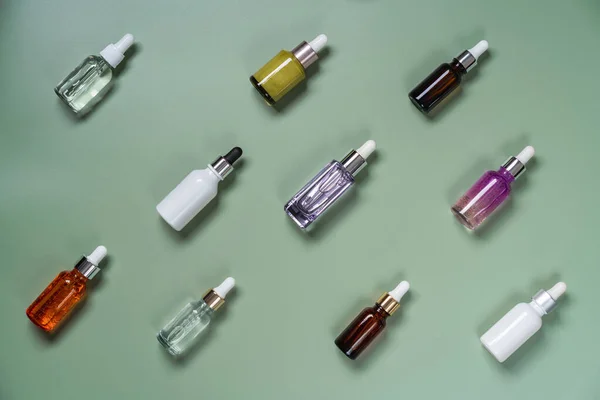 Bottles with serum or oil — Stock Photo, Image