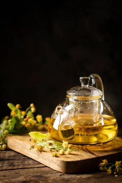 Teapot of linden tea — Stock Photo, Image
