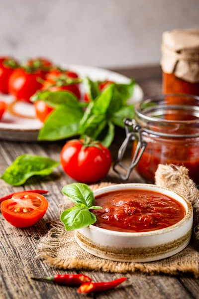 Bowl of italian tomato sauce — Stock Photo, Image