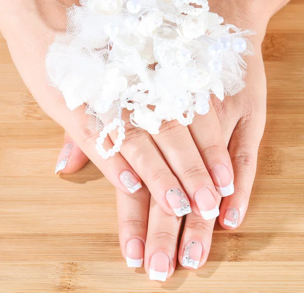 Female soft hands with beautiful french manicure — Stock Photo, Image