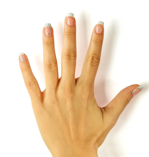 Krásné ženské ruce s francouzskou manikúru izolovaných na bílém — Stock fotografie