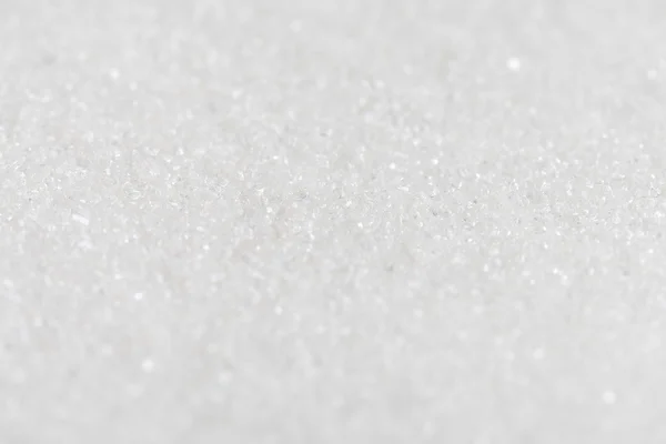 白色有机蔗糖的背景。选择性的焦点 — 图库照片