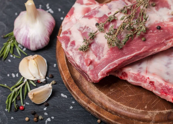 Fresh pork ribs, meat  with garlic allspice — Stock Photo, Image