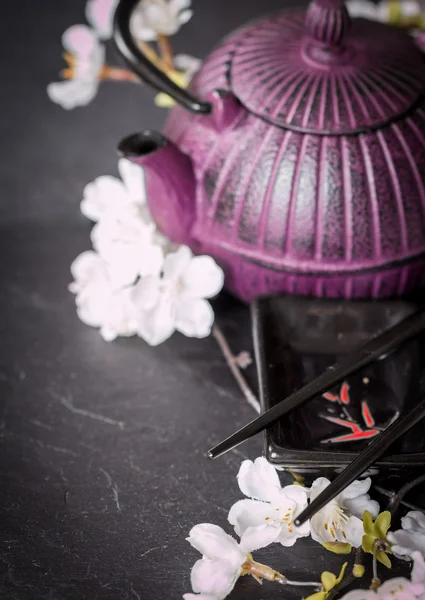 Chinese  Set, teapot, chopsticks and sakura branch — Stock Photo, Image