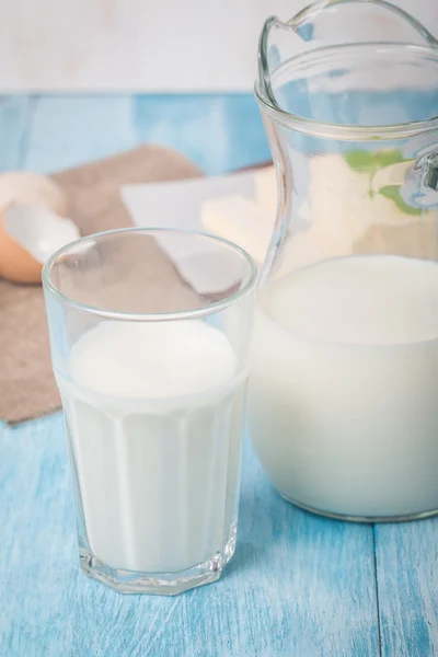 Glass jug and glass with milk — Stock Photo, Image