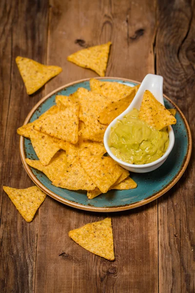 Mexican nachos with handmade guacamole sauce — Stock Photo, Image