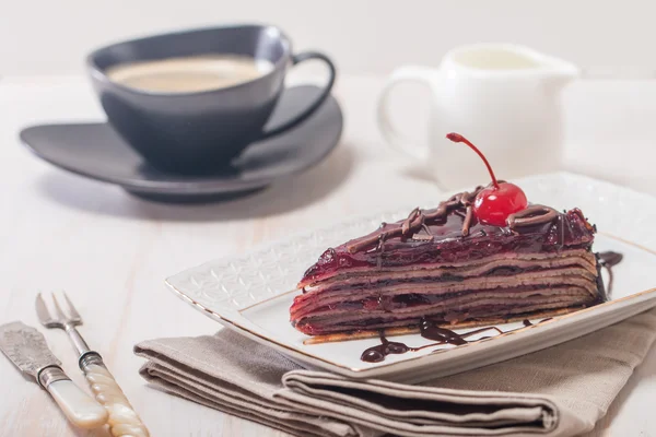 Layered chocolate cake  with  cherries — Stock Photo, Image