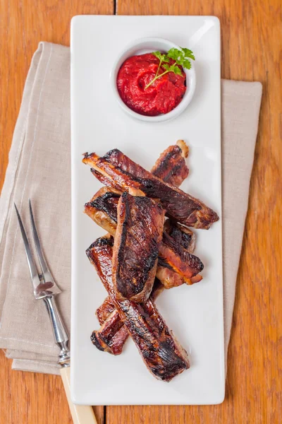 Svinekød Ribben med Tomatoe sauce - Stock-foto