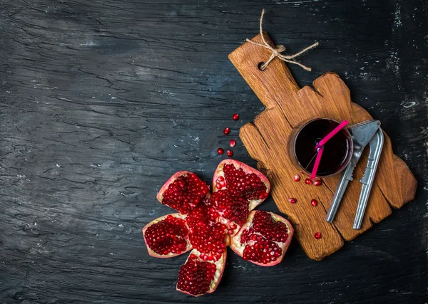 Ripe pomegranates with juice — Stock Photo, Image