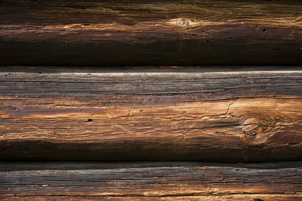 Fragment af væggen i den gamle træbygning - Stock-foto