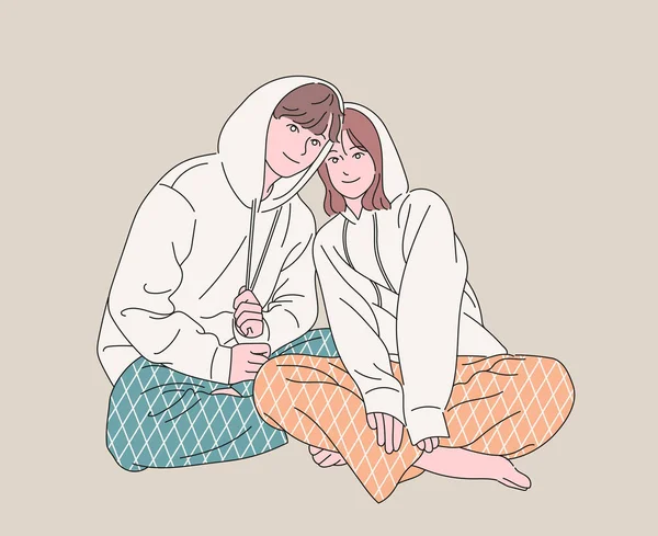 Cute Couple Sit Same Clothes Hand Drawn Style Vector Design — Vettoriale Stock