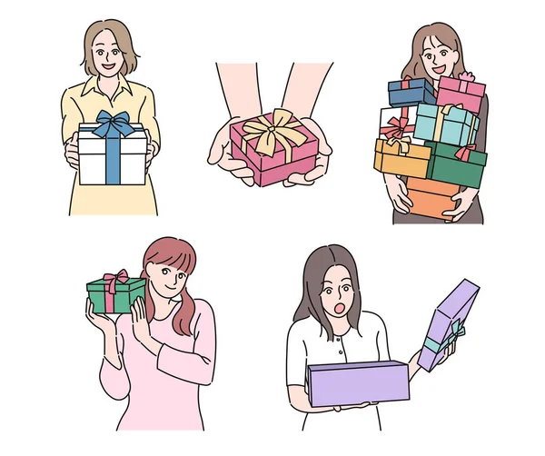 Women Holding Gift Boxes Tied Ribbons Hand Drawn Style Vector — Vettoriale Stock