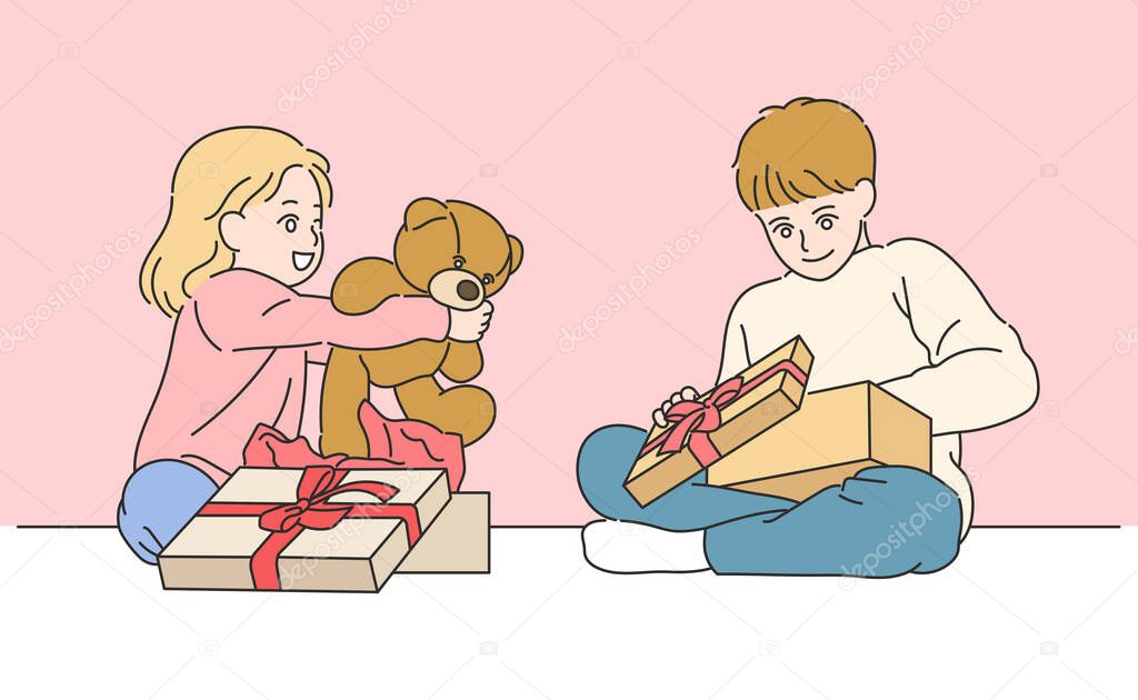 Cute girl and boy are sitting on the floor and opening a gift box. hand drawn style vector design illustrations.