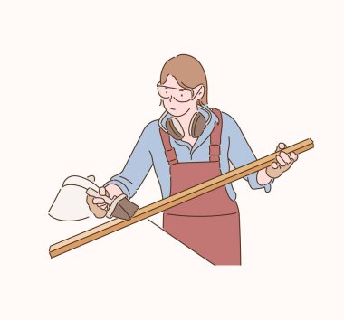 A carpenter is painting a piece of wood. hand drawn style vector design illustrations.