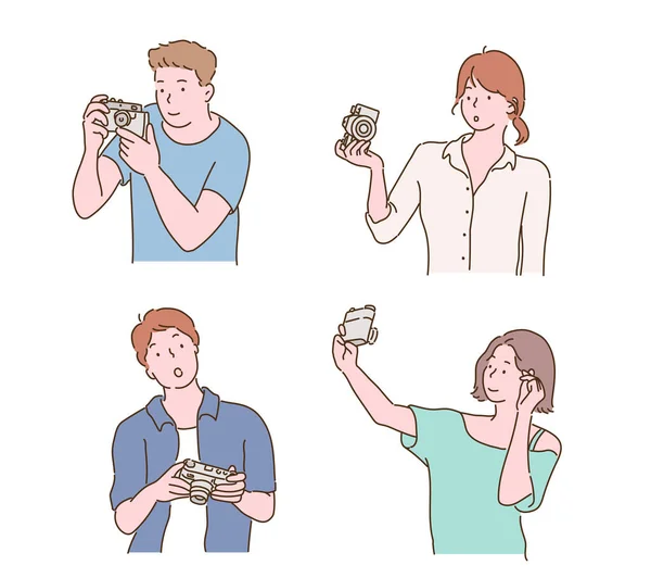 Collection People Holding Cameras Hand Drawn Style Vector Design Illustrations — Stok Vektör