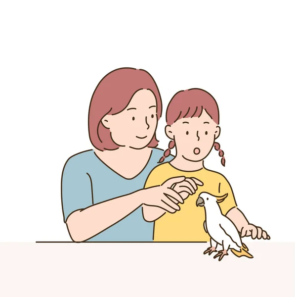 母親と娘はオウムを見ている 手描きのベクターデザインイラスト — ストックベクタ