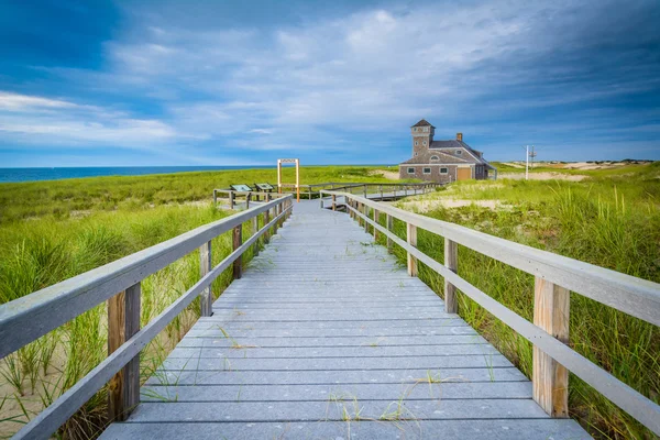 Boardwalk and the Old Harbor U.S. Life Saving Station, at Race P — Stock Photo, Image