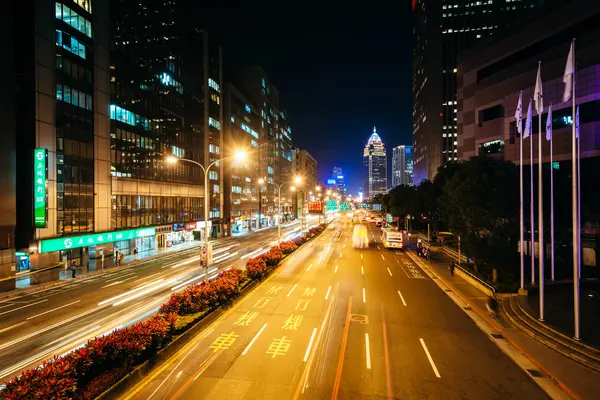 Modern buildings and street at night, in the Xinyi District, Tai — Stock Photo, Image