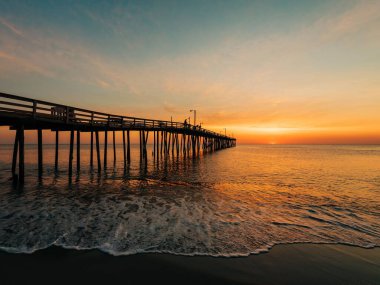 Nags Head Pier at sunrise, in the Outer Banks, North Carolina clipart