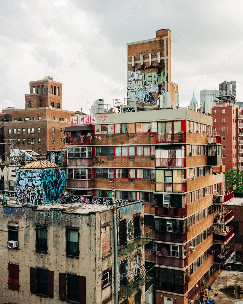 View of buildings in the Lower East Side covered in graffiti, from the Manhattan Bridge, New York City