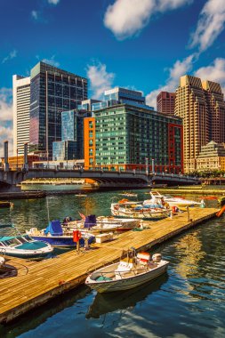 Boats and docks in Fort Point Channel, Boston, Massachusetts.  clipart
