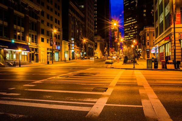An intersection at night in Baltimore, Maryland.