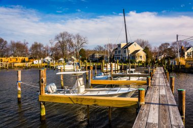 Docks in the harbor at Oxford, Maryland.  clipart