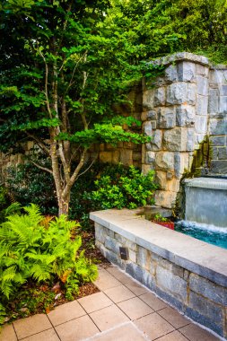Fountain and garden at Piedmont Park in Atlanta, Georgia.  clipart