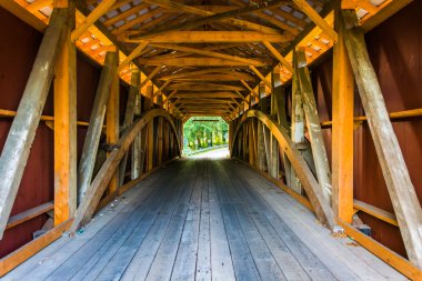 Interior of a covered bridge in rural Lancaster County, Pennsylv clipart