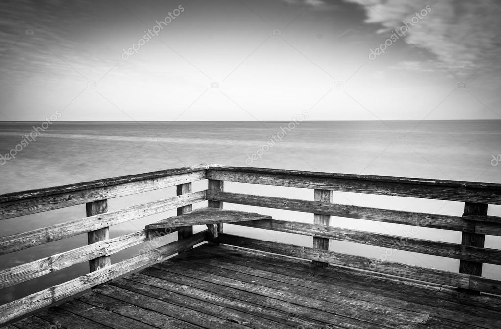 Long exposure a pier and the Chesapeake Bay in Chesapeake Beach,