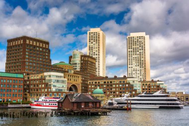 Ships and buildings in Boston, seen from Fort Point.  clipart