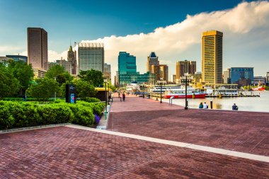The Waterfront Promenade and skyline at the Inner Harbor in Balt clipart