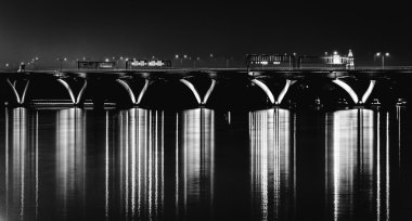 The Woodrow Wilson Bridge at night, seen from National Harbor, M clipart