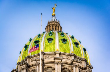 The dome of the Pennsylvania State Capitol in Harrisburg, Pennsy clipart