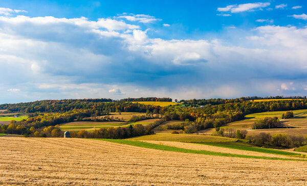 View of rolling hills and farm fields in rural York County, Penn