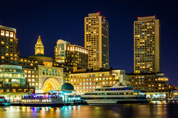 Rowes Wharf at night, seen from Fort Point, in Boston, Massachus