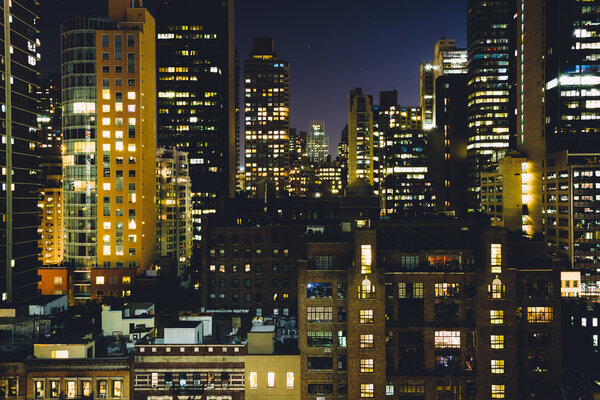 View of buildings in the Turtle Bay neighborhood at night, from a rooftop on 51st Street in Midtown Manhattan, New York.