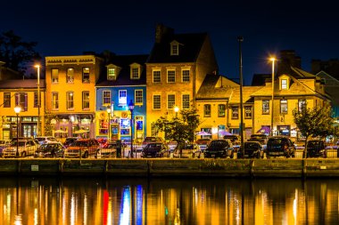Shops and restaurants at night in Fells Point, Baltimore, Maryla clipart