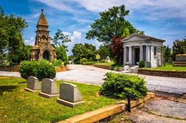 Graves and mausoleums at Oakland Cemetary in Atlanta, Georgia.  clipart