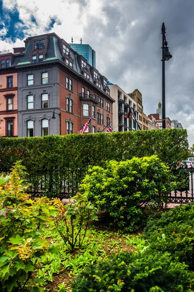 Beautiful garden and buildings in Boston, Massachusetts.