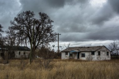 Abandoned houses in Moriarty, New Mexico. clipart