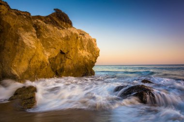Rocks and waves in the Pacific Ocean, at El Matador State Beach, clipart