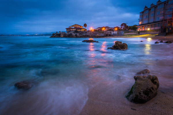 Rocky beach at twilight, in Monterey, California.
