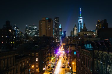 View of Monroe Street at night, from the Manhattan Bridge Walkwa clipart