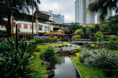 Bahçeleri ve gökdelenler Greenbelt Park, Ayala, Makati, Met