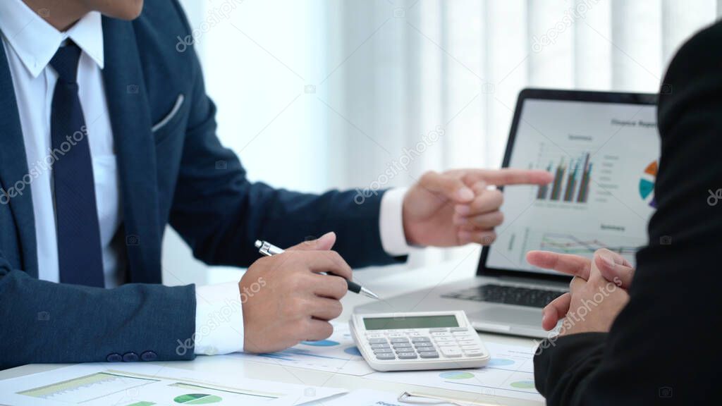 Business concept a male startup entrepreneur presenting business data to an investor for the business expansion