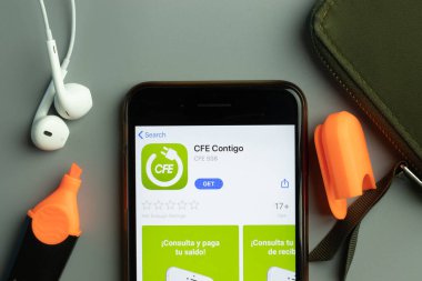 New York, USA - 26 October 2020: CFE Contigo mobile app icon logo on phone screen close-up, Illustrative Editorial.