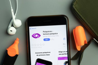 New York, USA - 26 October 2020: Psiquicos mobile app icon logo on phone screen close-up, Illustrative Editorial.