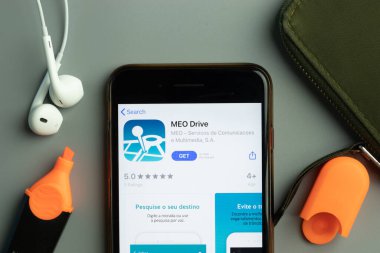 New York, USA - 26 October 2020: MEO Drive mobile app icon logo on phone screen close-up, Illustrative Editorial.