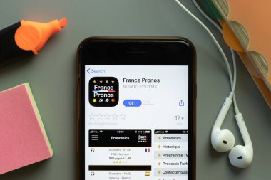 New York, ABD - 1 Aralık 2020: Fransa Pronos mobil uygulama simgesi telefon ekranının üstünde, İllüstrasyon Editörü.